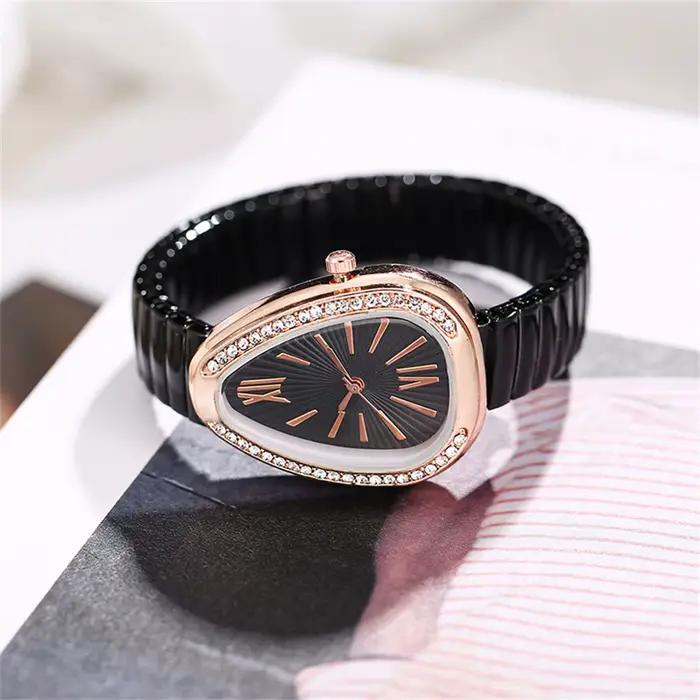 Montre élégante pour femme, forme de larme, avec cadran en cristal, or rose, bracelet élastique blan
