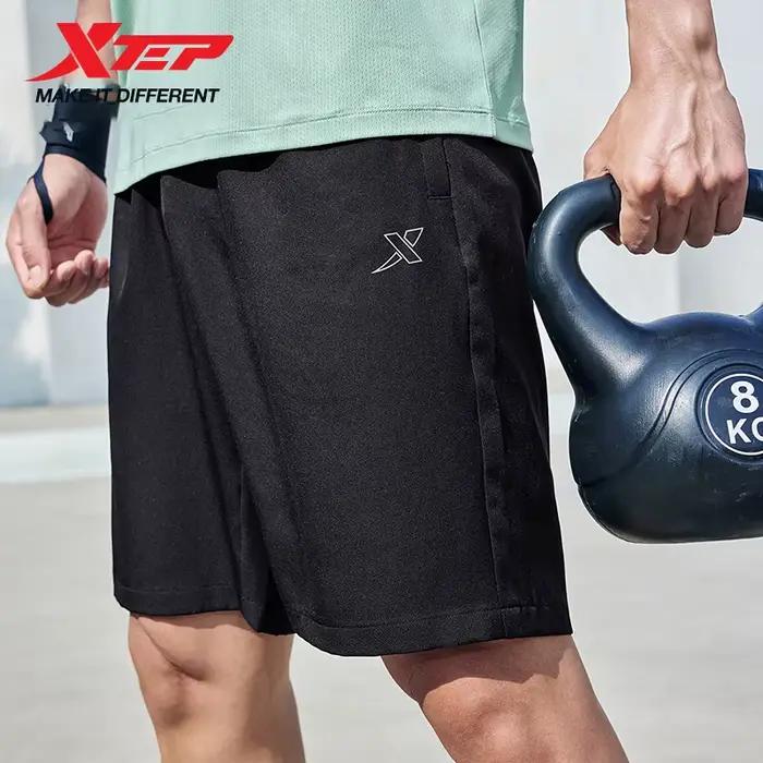 XTEP hommes t-shirt Shorts 2025 printemps été Absorption des chocs coussin hauts bas escalade en ple