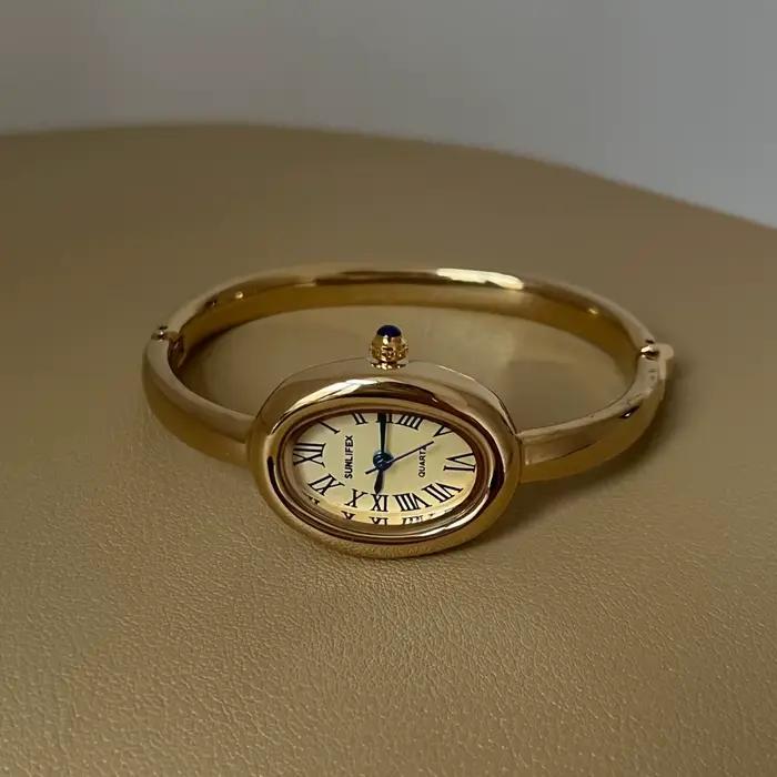 Montre de baignoire femmes haut de gamme or Rose lumière luxe rond Bracelet en métal montres dames m