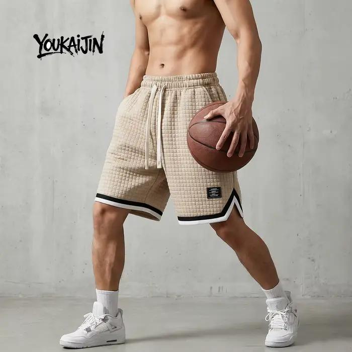 Shorts de sport d'été pour hommes, texture gaufrée, ourlet fendu sur le côté, pour le basketball, la