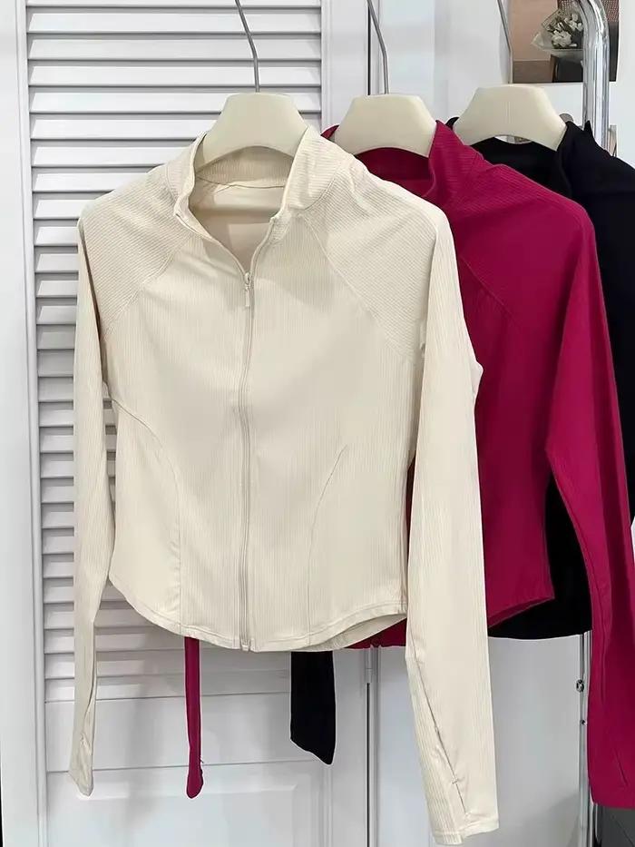 Veste de sport à manches longues zippée pour femme, haut de gamme pour l'entraînement professionnel,