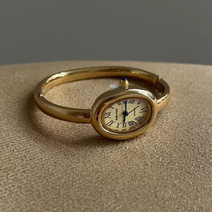 Montre de baignoire femmes haut de gamme or Rose lumière luxe rond Bracelet en métal montres dames mode Quartz