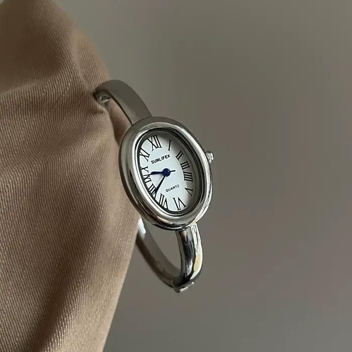 Montre de baignoire femmes haut de gamme or Rose lumière luxe rond Bracelet en métal montres dames mode Quartz