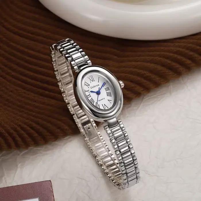 Montre pour femme ceinture en acier haute beauté ovale baignoire Simple