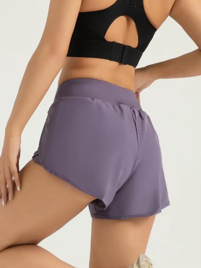 Short de course léger pour femme avec poches et doublure design taille haute technologie évacuation humidité confort et praticité occasions sportives entraînements activité physique