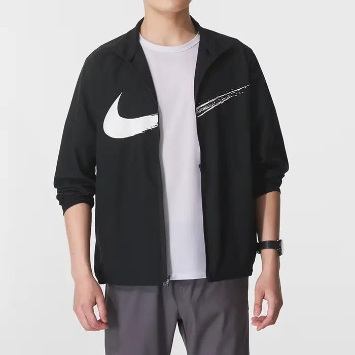 Nike Veste tissée coupe-vent à col montant pour hommes