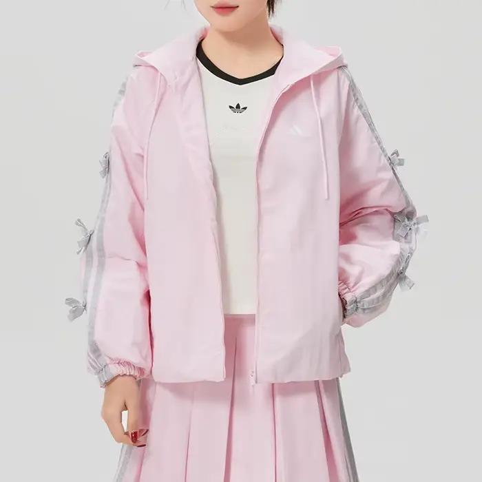 Adidas Veste coupe-vent à capuche pour femme Coupe ample Vêtements de sport décontractés KR7603